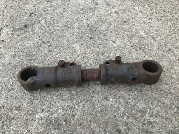 Trailer torque rod adjuster